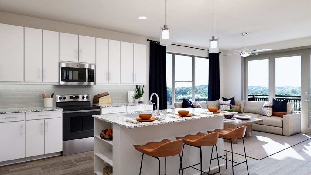 Kitchen island cabinets and  living room windows at Ironcrest, North Richland Hills