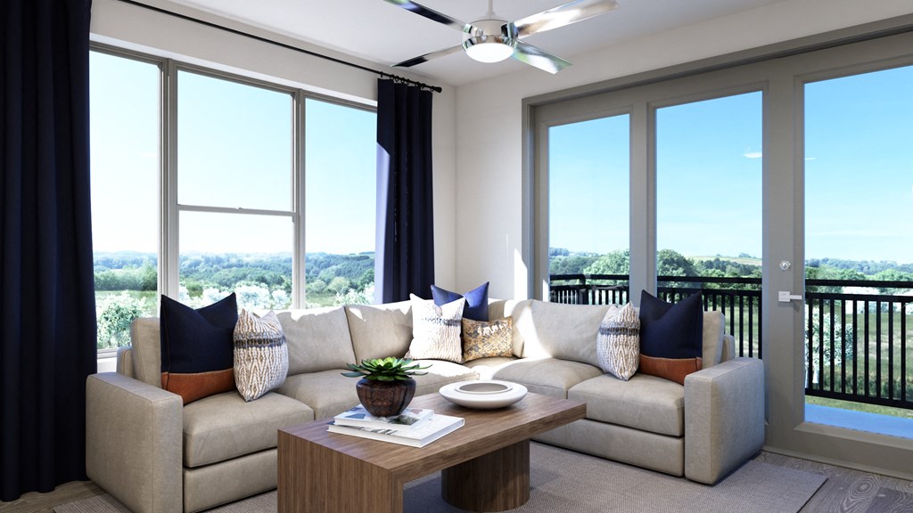 Model Apartment, living room area with windows at Ironcrest, Texas