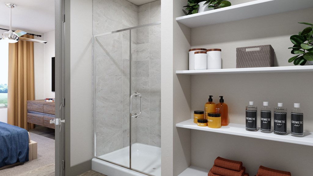 Model apartment bathroom area with shower stall at Ironcrest, Texas, 76180