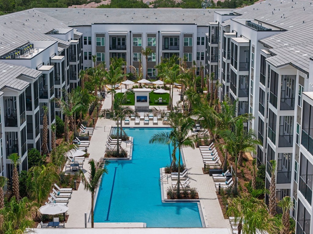 an aerial view of swimming pool courtyard Mira at Palmer Ranch