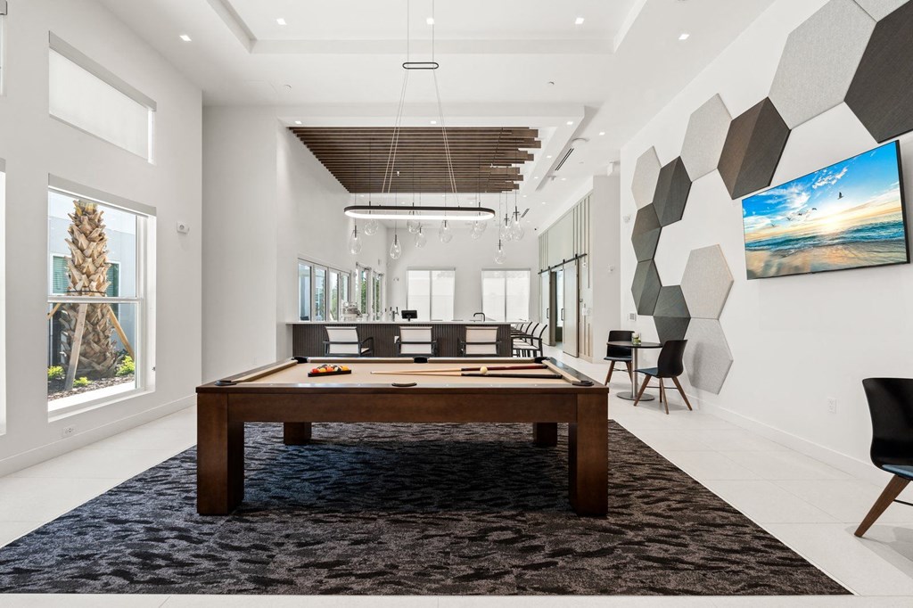 a game room with a pool table at Mira at Palmer Ranch