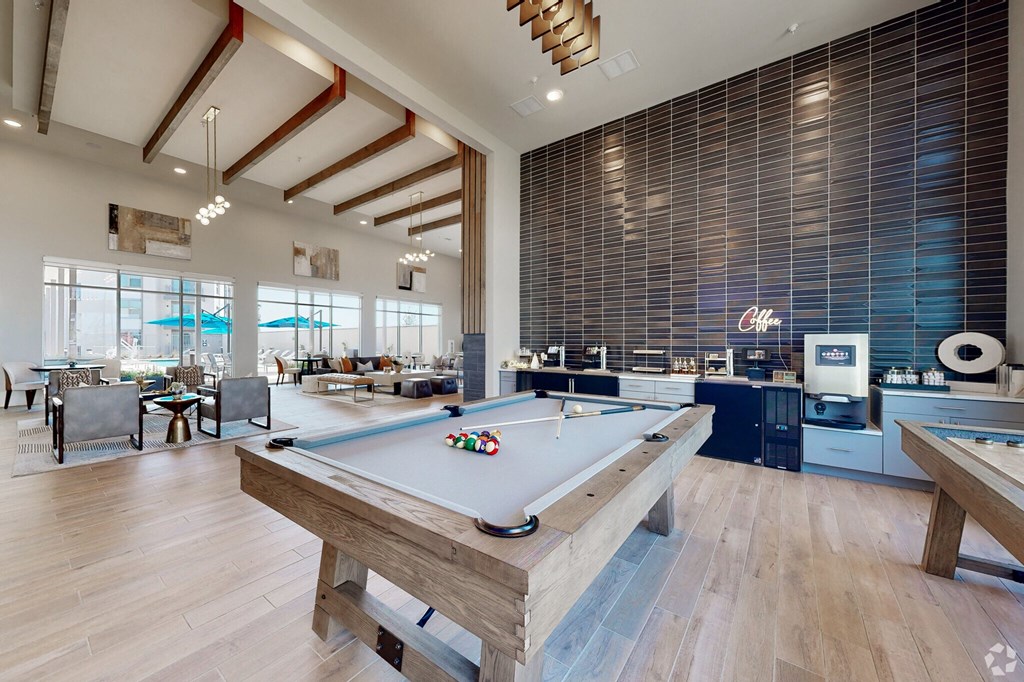 pool table and coffee bar in clubhouse Ironcrest apartments