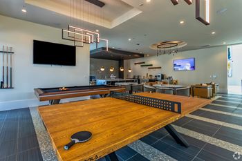 game room with ping pong table at LynnCora in Grand Prairie, TX