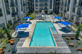 an aerial view of the pool lounge area at LynnCora in Grand Prairie, TX