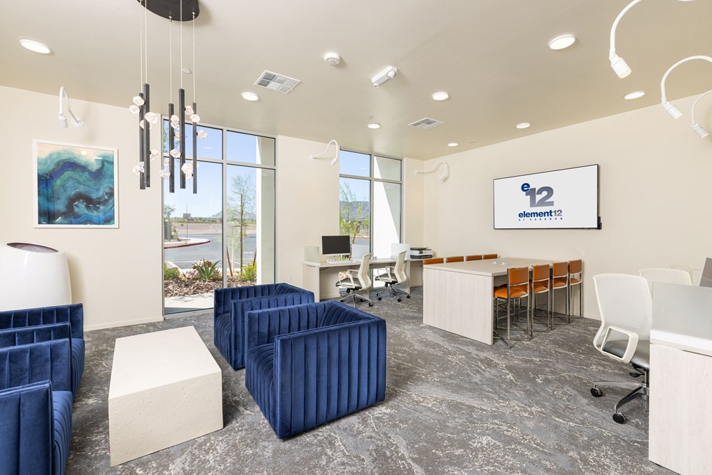 a seating area with couches and chairs