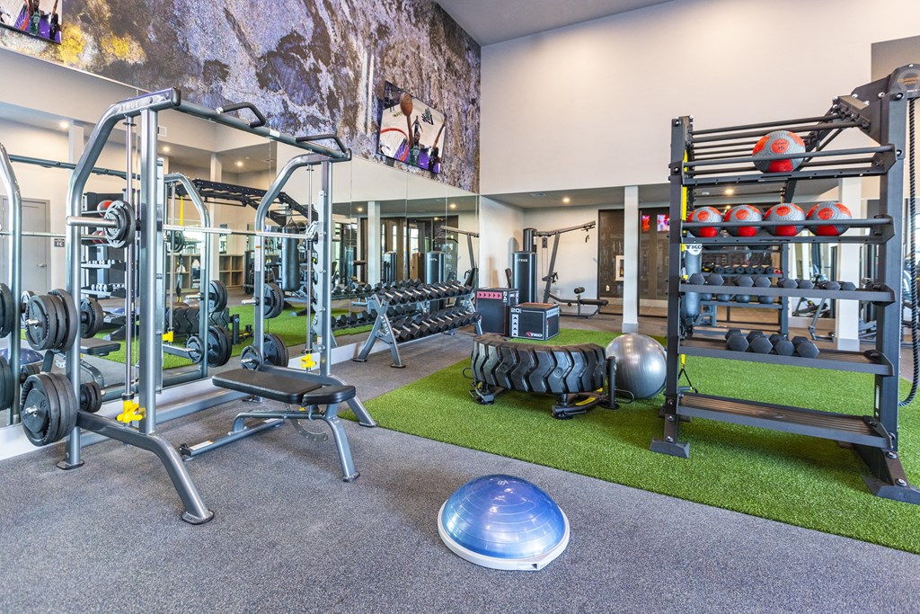 24 hour athletic center with weights and other exercise equipment