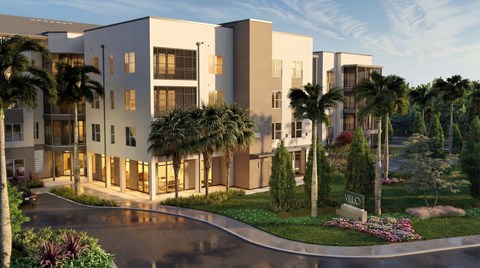 Modern apartment buildings with tropical landscaping at Velo Luxury Apartments, Sarasota, Florida