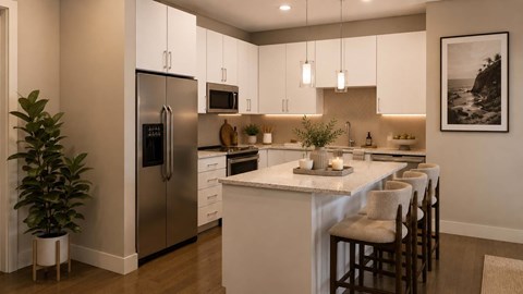 A modern kitchen with a refrigerator, stove, and bar stools.