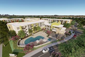 an aerial view of pool lounge area with Zeta apartment buildings at Zeta Luxury Apartments, California