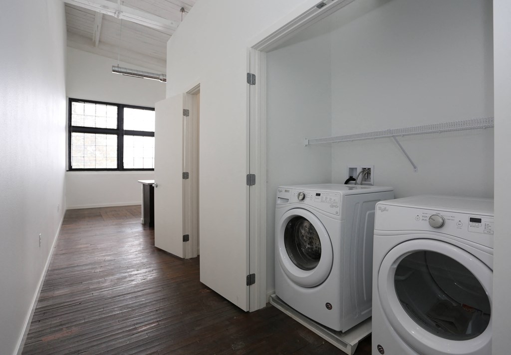 A laundry room with a washer and dryer.
