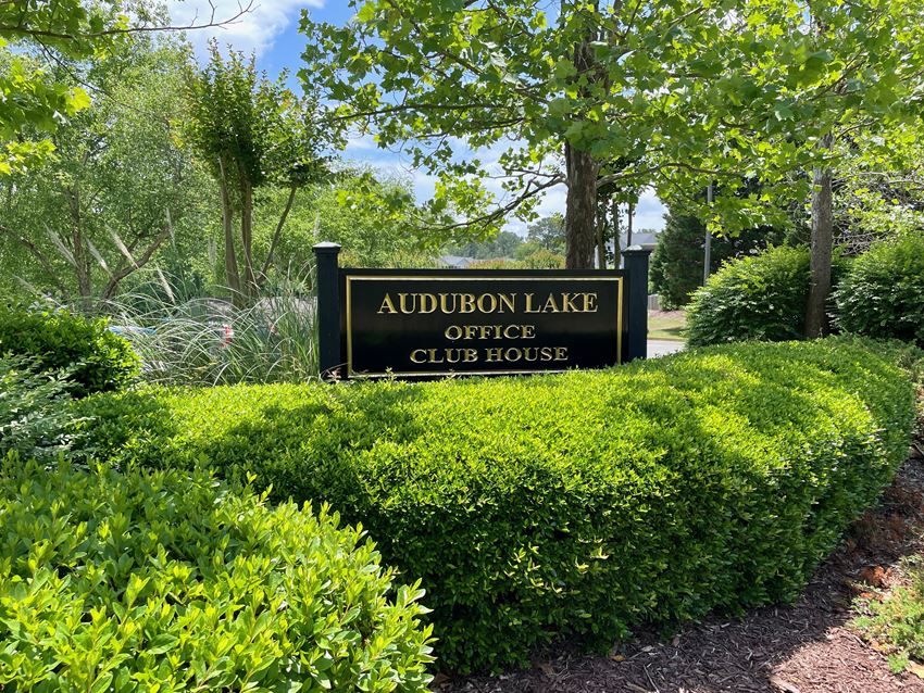 a sign for the audubon lake office club house - Photo Gallery