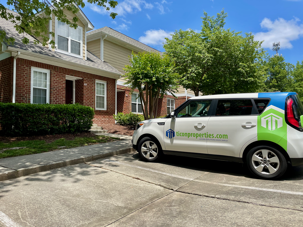 Highgate Townhomes and Ticon Car A Ticon Car parked outside of Highgate Townhomes.