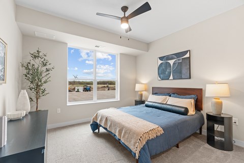 A bedroom at Oberon Apartments in Maplewood, MN.