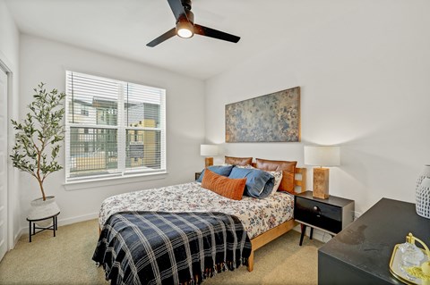 A bedroom at Bluff View at Frederick Creek in Boerne, Texas.