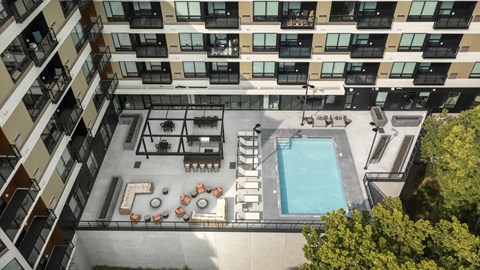 The outdoor patio and swimming pool An aerial exterior view of Risor of Bloomington.