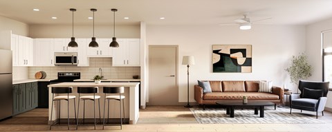 A modern kitchen with a bar and a brown couch.
