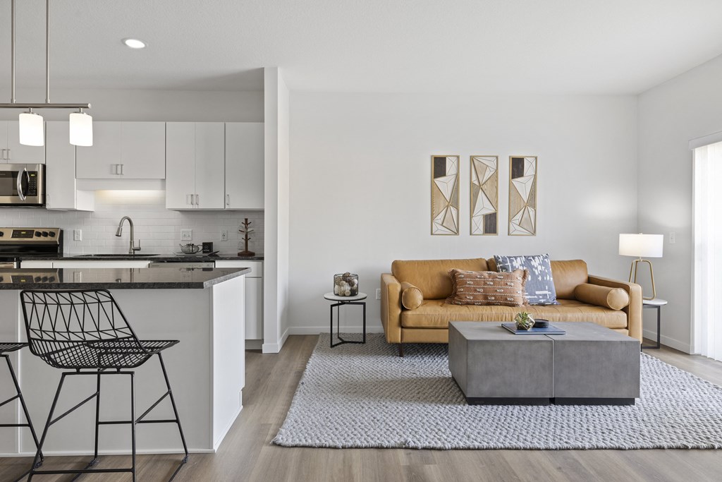 a living room with a couch and a table