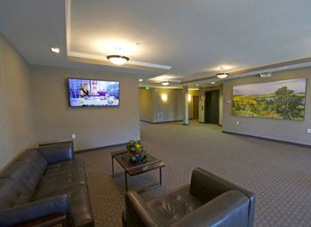 a large room with couches and a coffee table
