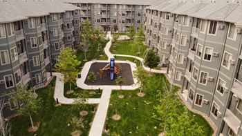 an aerial view of an apartment complex with a playground