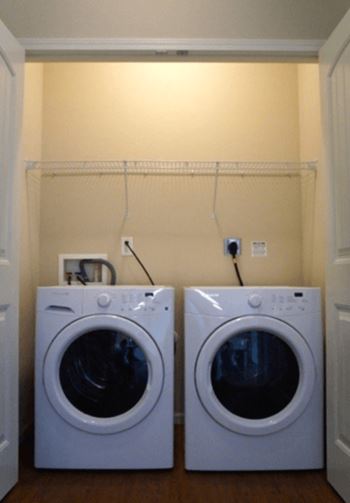 a washer and dryer in the laundry room