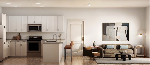 A modern kitchen with white cabinets and a large painting on the wall.
