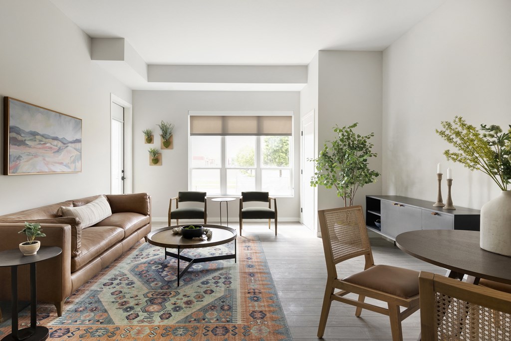 a living room with a couch and a table