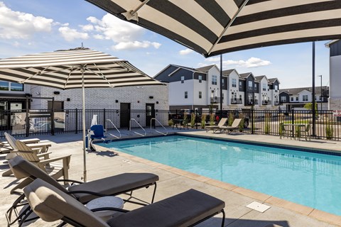 Outdoor pool and pool deck at The Espen Residences in Oakdale, MN.