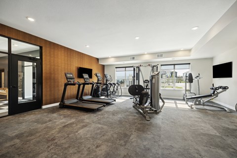 Fully equipped fitness center at The Espen Residences in Oakdale, MN.