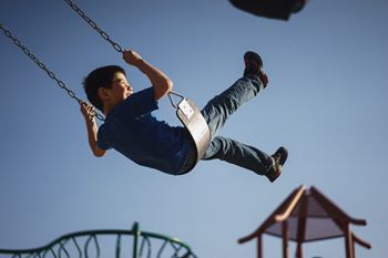 a boy on a swing