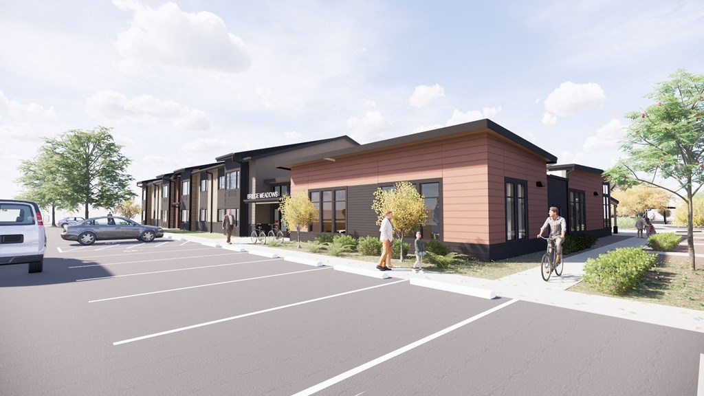a rendering of a building with a street in front of it