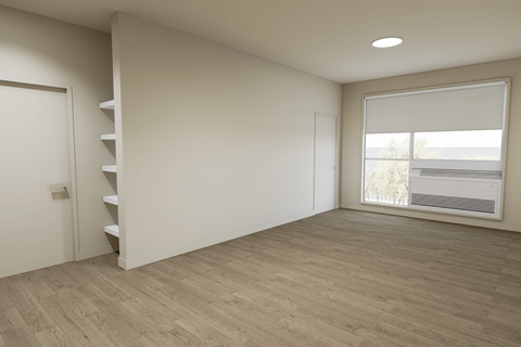 A room with a window and a staircase.