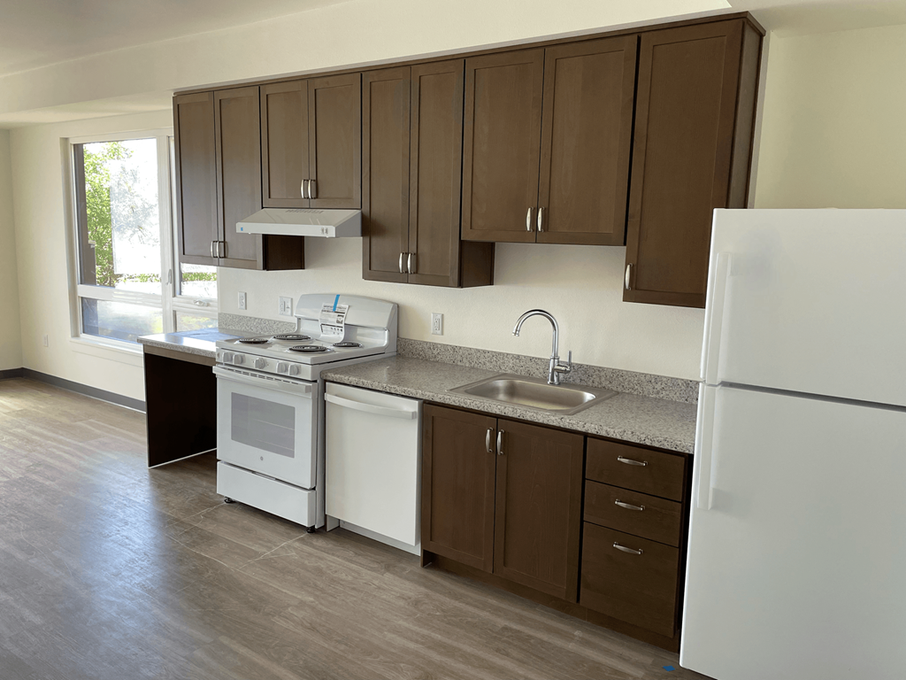 a kitchen at the acadia park apartments in houma, la