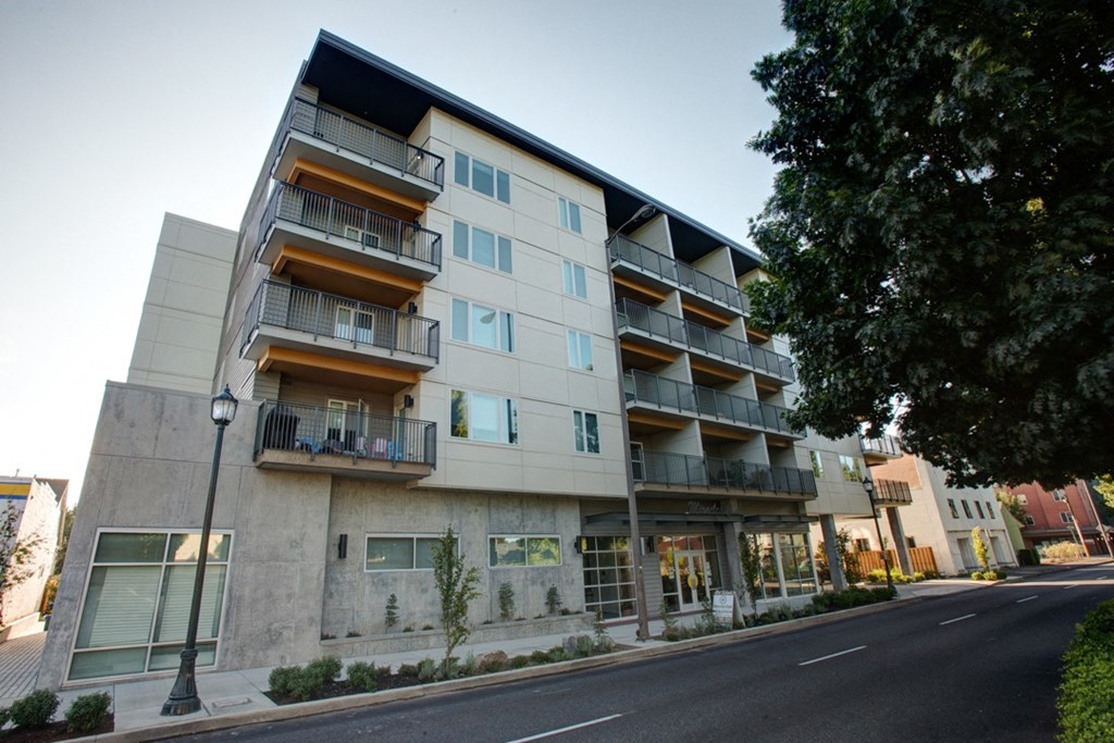 an image of an apartment building on a city street