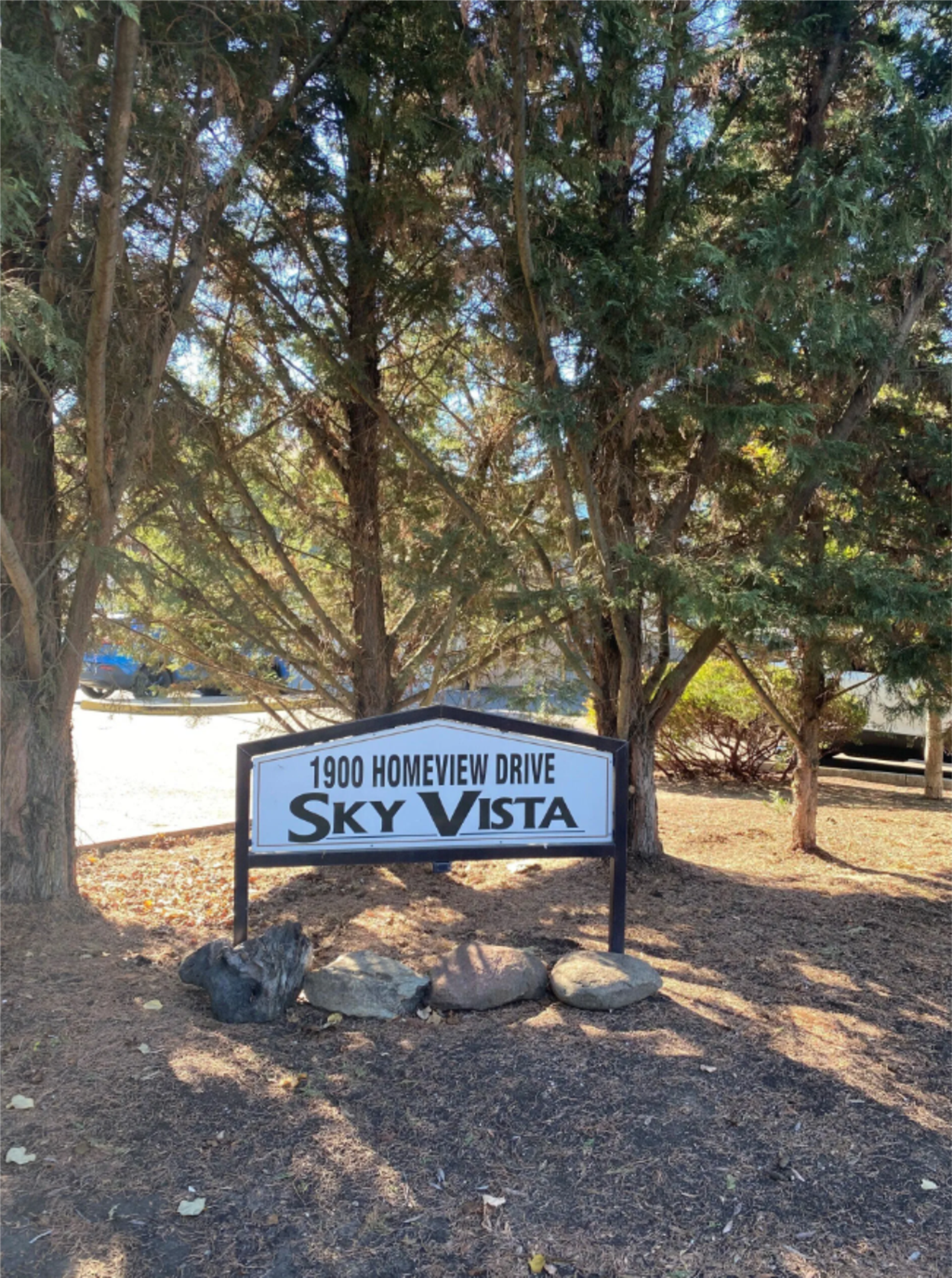 View of Sky Vista Property Sign Surrounded by Trees