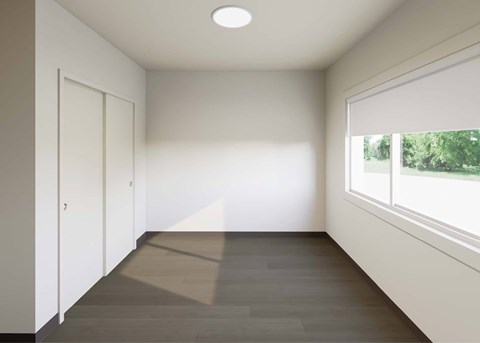 A room with a window and a door.
