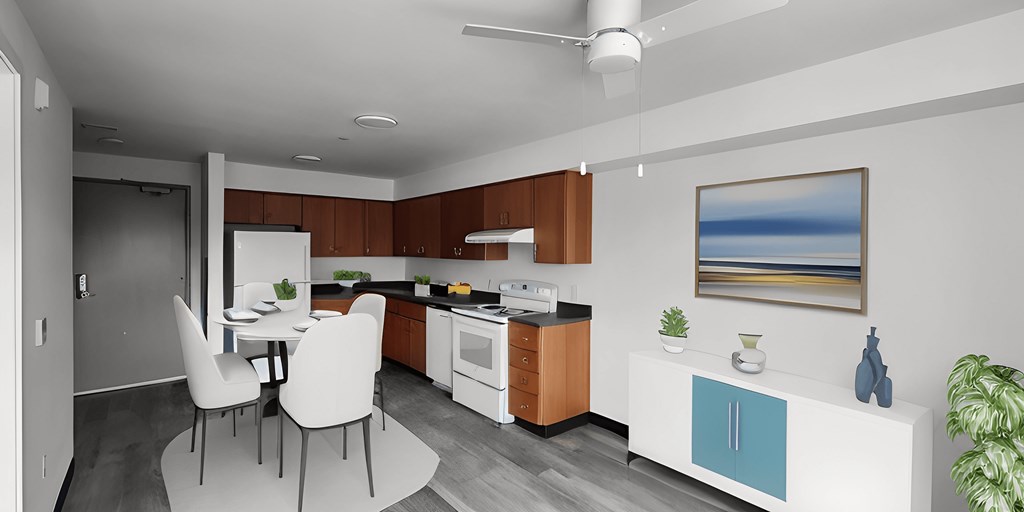 a kitchen and dining room with a table and chairs