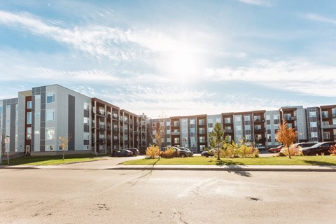 A sunny day at a modern apartment complex.