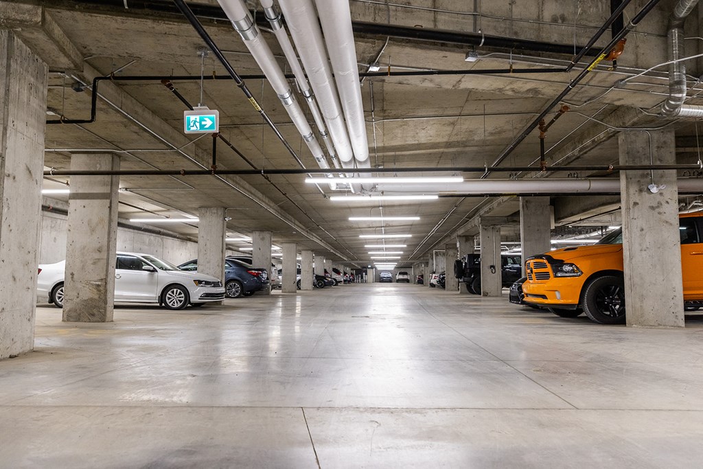 a parking garage with cars parked in it