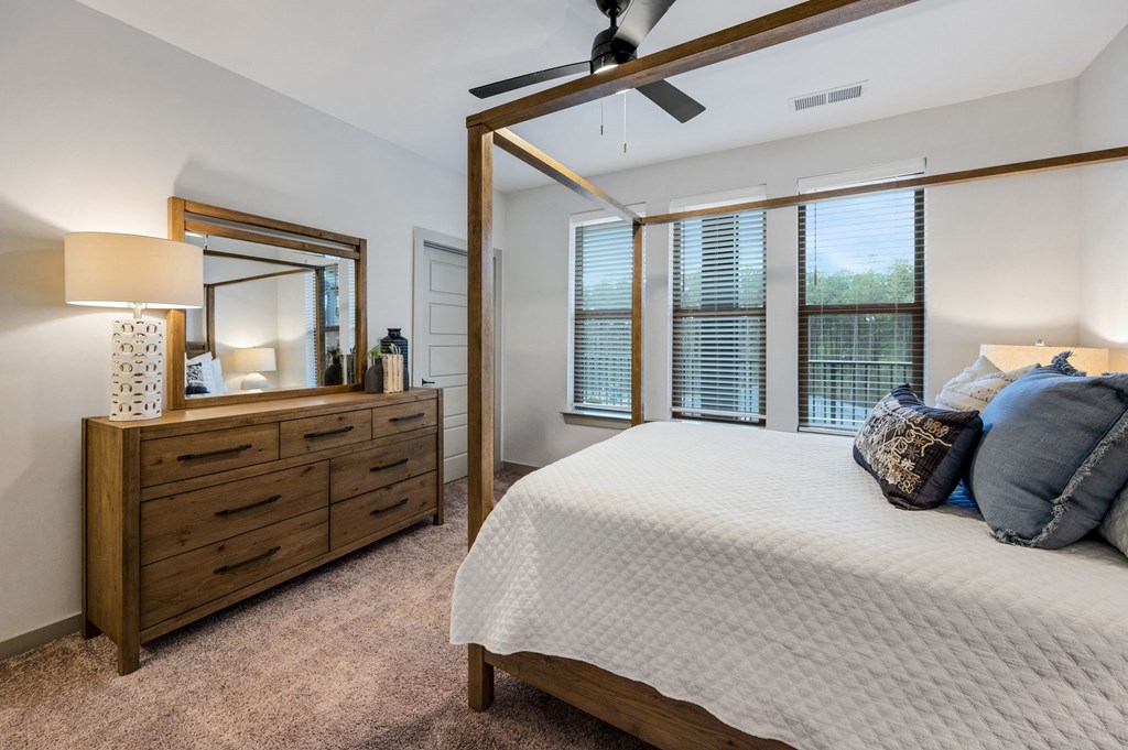 a bedroom with a large bed and a large window at Preston Ridge, North Carolina