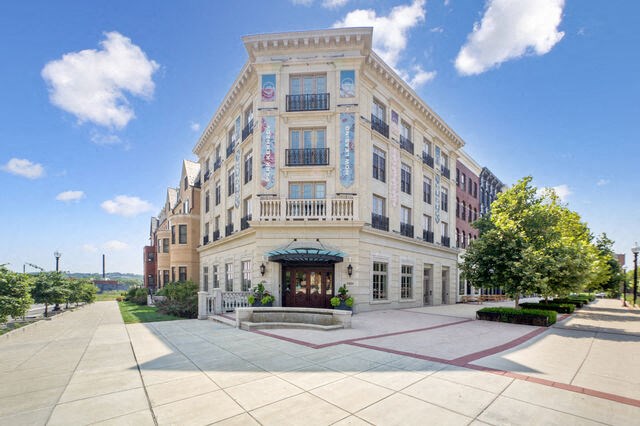 a large white building with a sidewalk in front of it at Park Kennedy, Washington, DC