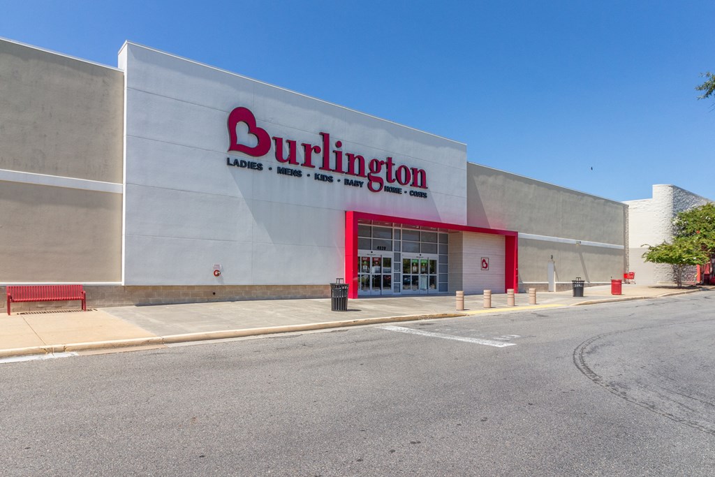 a large white building with a red and black sign that reads burlington at Fairmont at South Lake, Bowie, 20716