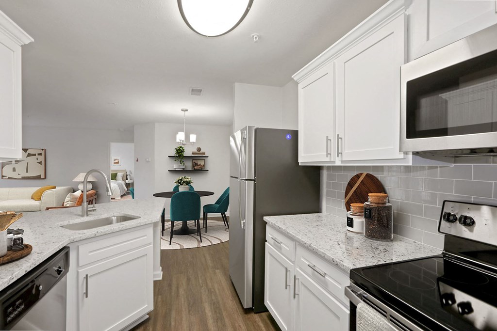 Kitchen with dining room at The Fields of Manassas