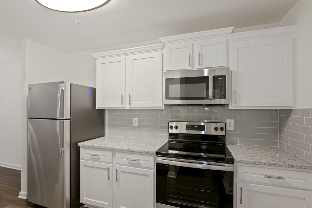 Electric Range In Kitchen at The Fields of Manassas, Manassas, Virginia
