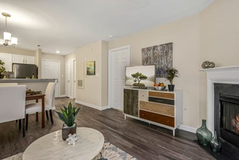 Living Room With Fireplace Living Room With Fireplace at Westerly at Worldgate, Herndon - Photo Gallery 2