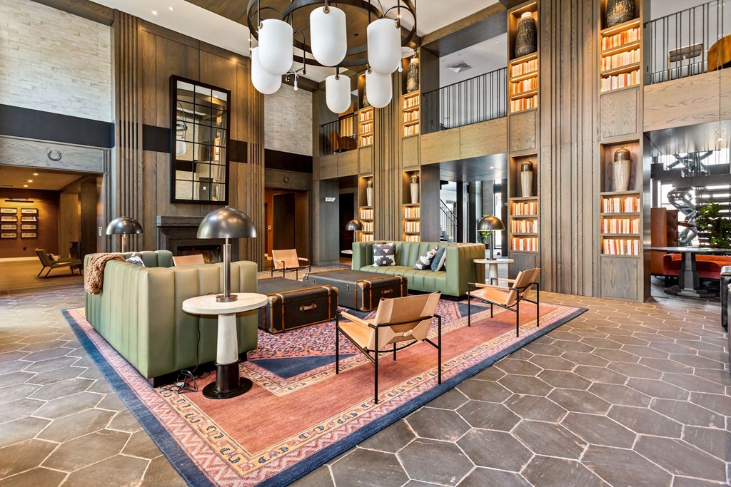 a large lobby with couches chairs and tables at Vyne One Loudoun, Virginia, 20147