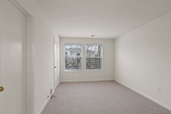 Living Room With Expansive Window at The Fields of Manassas, Virginia - Photo Gallery 20
