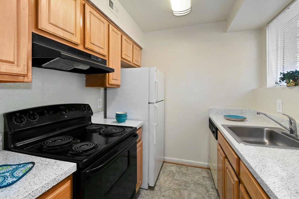 Fully Furnished Kitchen With Stainless Steel Appliances at The Fields of Old Town, Alexandria, Virginia