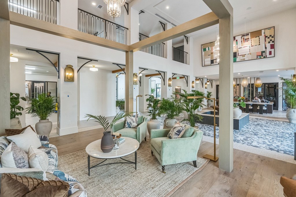 an open living room with couches and a coffee table  at La Unión, Florida, 33605