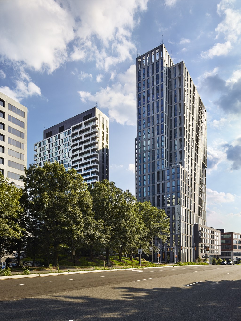 a cityscape with tall buildings and a street in the foreground at The Boro, Virginia