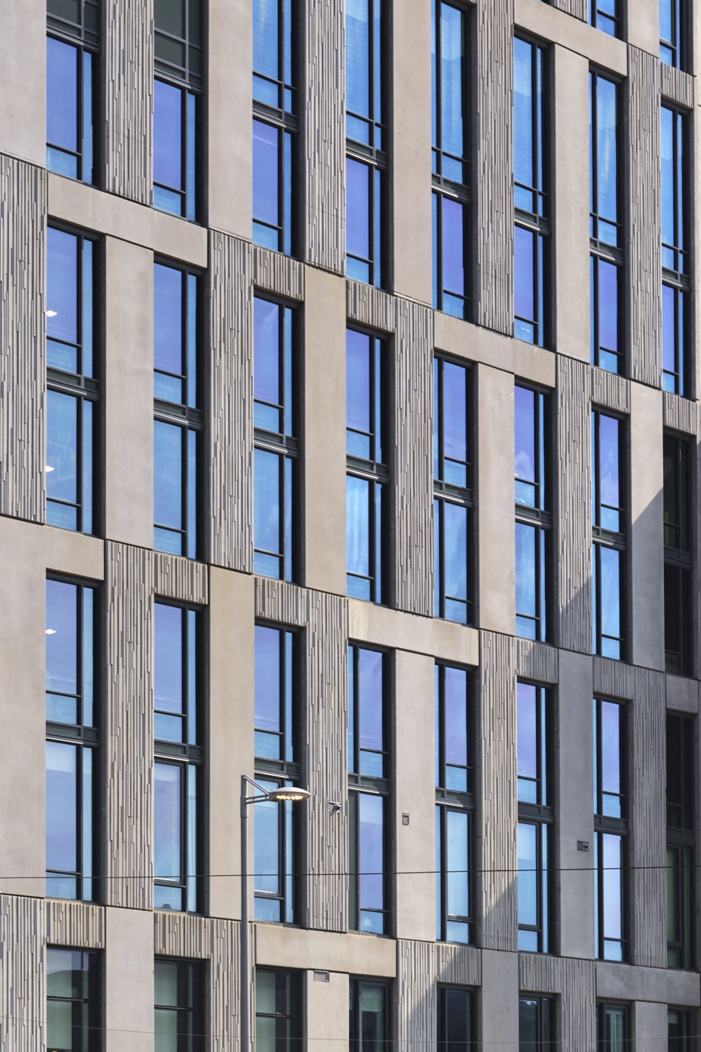 a close up of a building with many windows at The Boro, Tysons, 22102